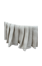 Felicity Skirted Swivel Ottoman