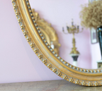 Louis XVI Gilded Oval Mirror - Ornate Carvings